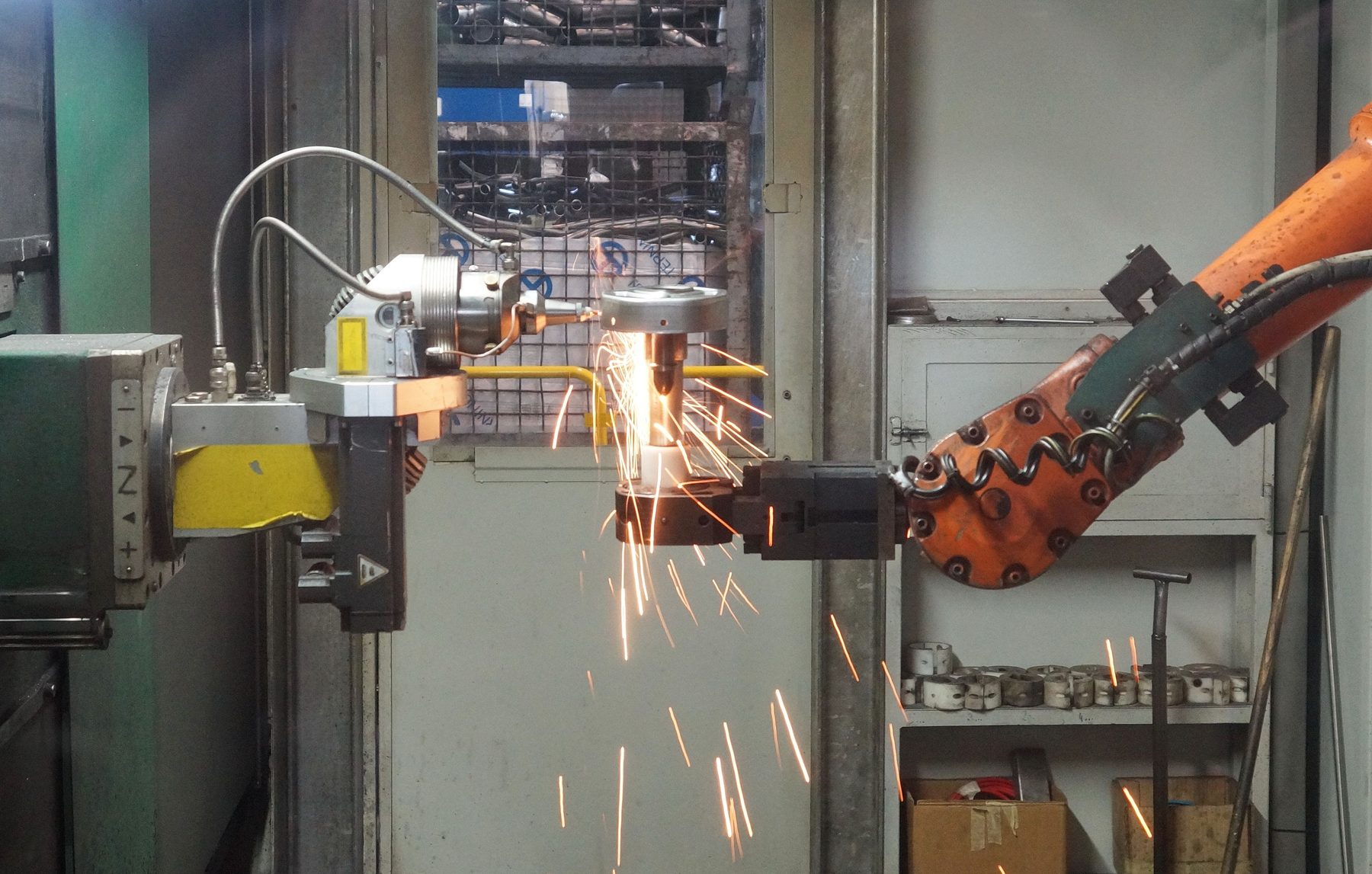Robotic laser cutting cell in operation